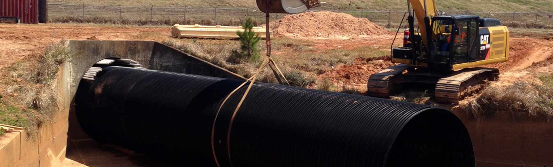 DuroMaxx steel-reinforced polyethylene pipe is being used to slip line a culvert at an airport. 