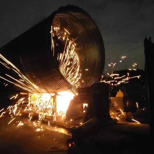 Contech's MOBILE-PIPE mill manufacturing corrugated metal pipe. 