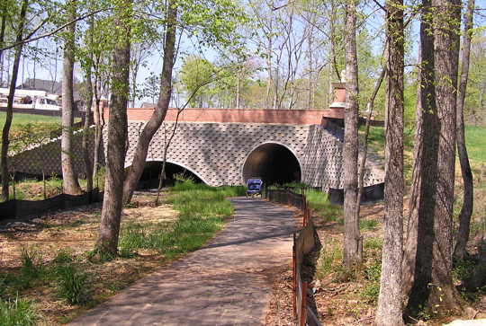 Structural plate being used for pedestrian and recreation traffic under a roadway.