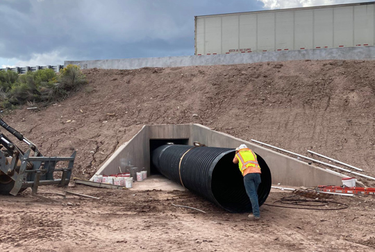 A culvert being relined with DuroMaxx steel reinforced polyethylene (SRPE) pipe.