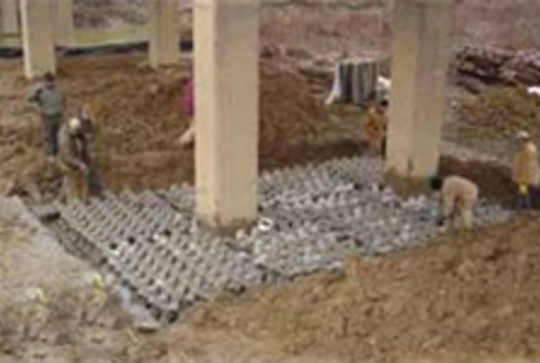 Ajacks concrete armor units protecting a bride from scour. 