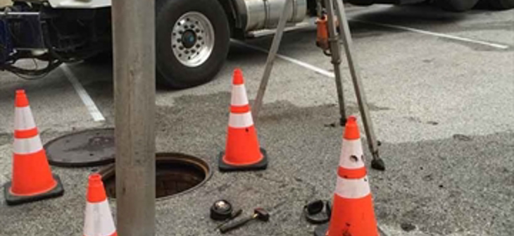 Maintenance is being performed on a stormwater system.